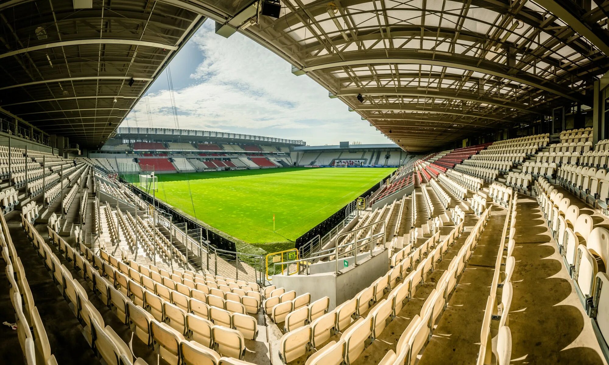 Stadion. Рейн энерги Штадион футбольный стадион. Стадион Эрнеста поля. Краковия стадион трибуны. Город Биллингем стадион.