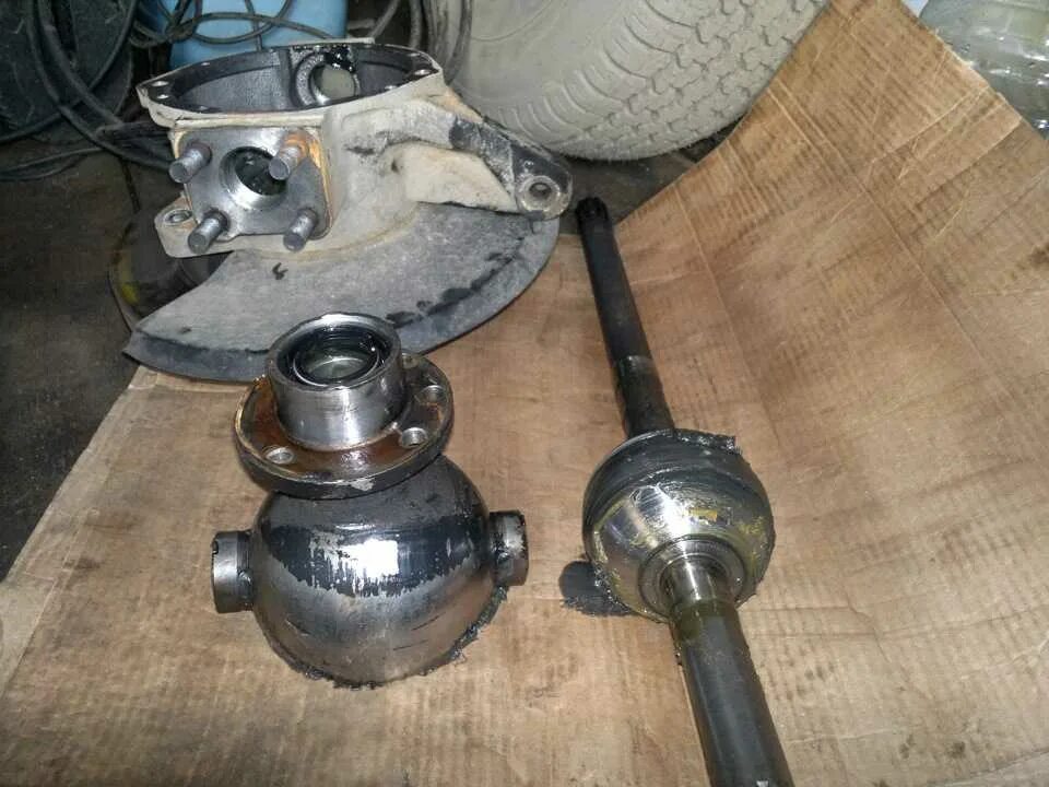 Шрус луаз 969м. Шрус карданного вала нива шевроле. Zekkert aw4207. Привод переднего моста уаз буханка. Пыльник шруса кардана 2217.