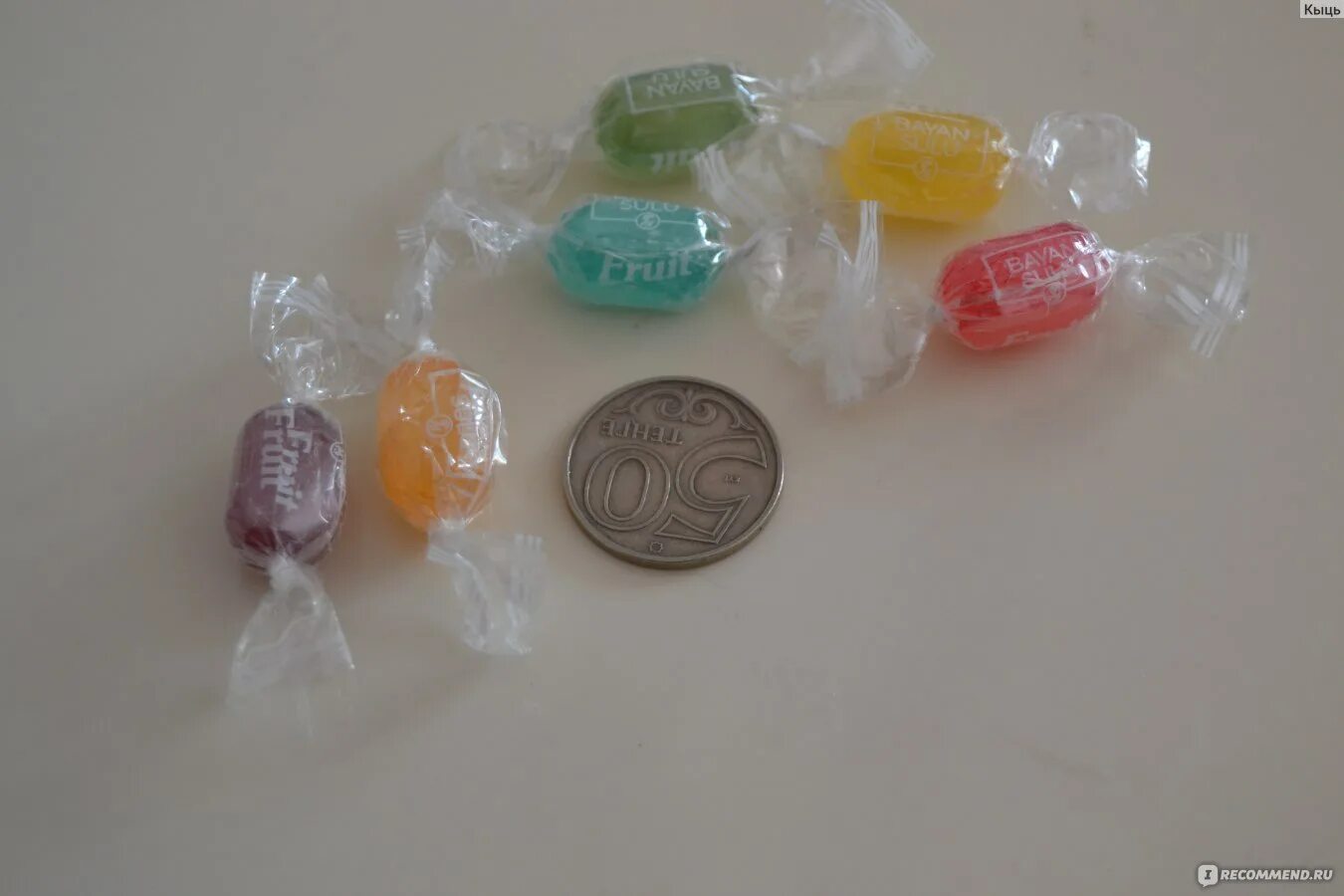 Конфеты в фантиках. Много разных конфет. Самые маленькие конфеты. Сосательные конфеты карамелька. Самые маленькие конфеты.