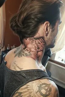 Details 55+ devil whispering into ear tattoo best - mips-computer.com