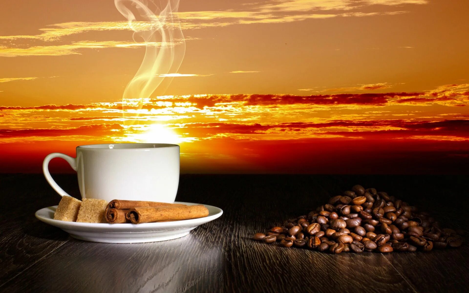 Cup of coffee with a pattern on the foam on a table with a bouquet of roses, gra
