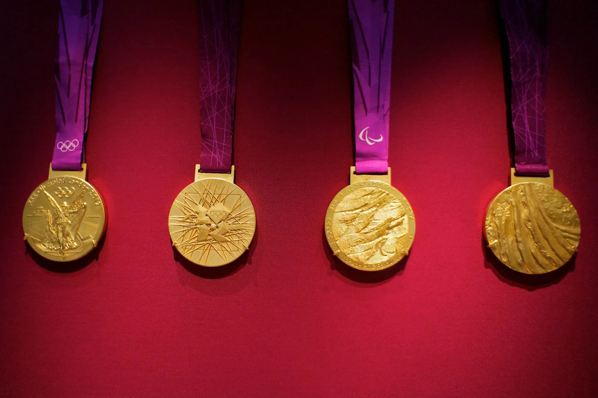 The most medals. Олимпийская медаль Лондон 2012. Золотая Олимпийская медаль. Золотая медаль Олимпийских игр 2012. Современные медали.