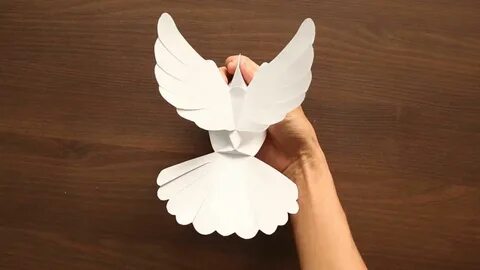 Белый голубь из бумаги