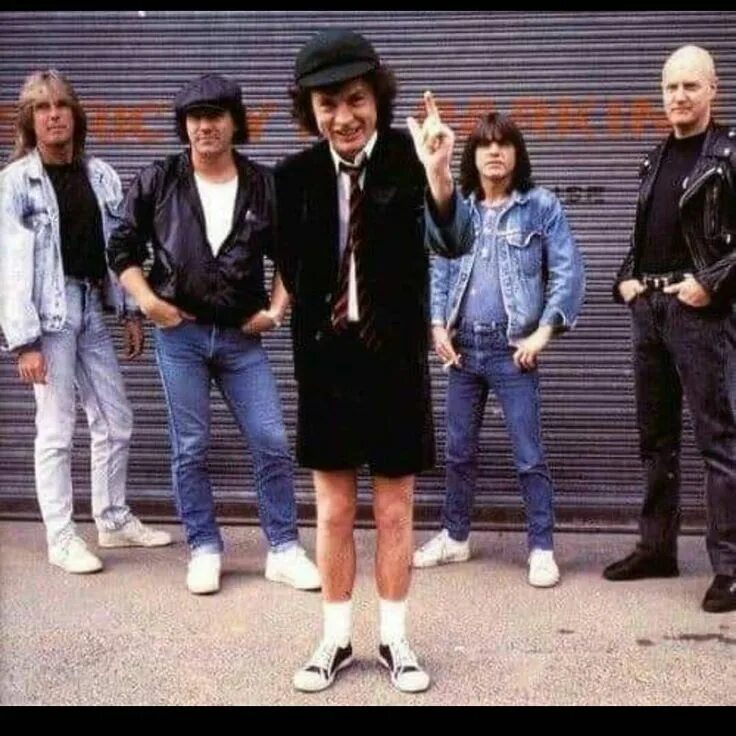 Группа ac/dc 1973. Ac dc обложка. Ac dc moneytalks. Ac dc 70s. Ac dc 70s.