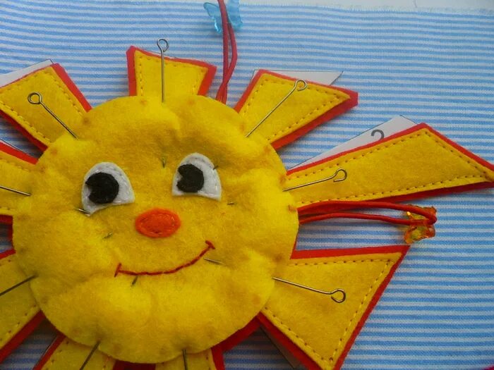 масленица из фетра. солнышко из фетра на масленицу. масленица из фетра. масленица из фетра. солнышко из фетра для развивающей книжки.