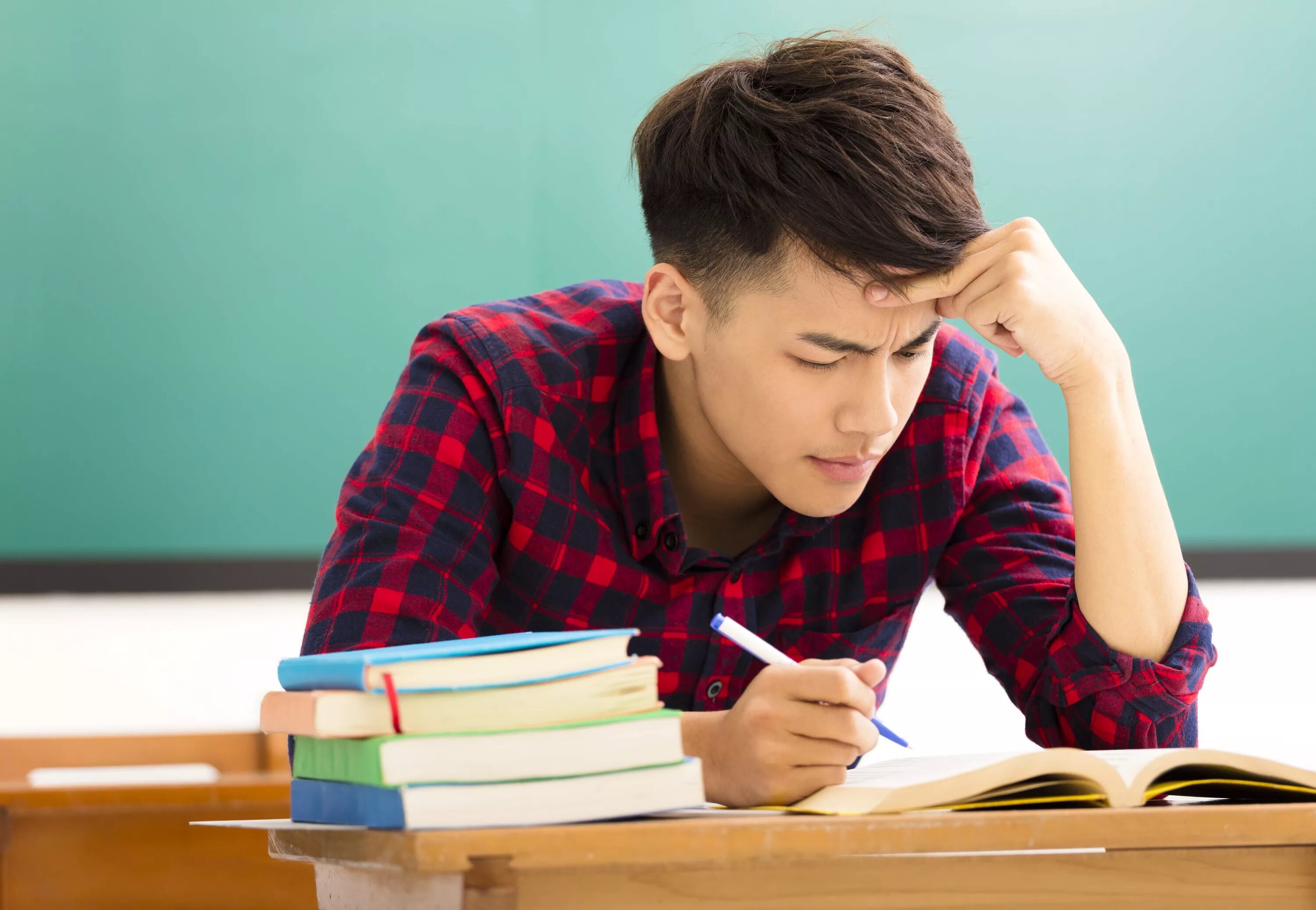 He a student now. Подросток думает. Студент думает. Ученик задумался. Подросток на экзамене.