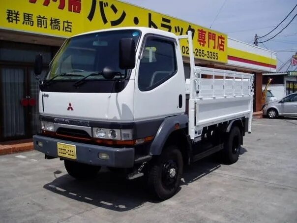 Nissan Atlas бортовой, 1998. Митсубиси Кантер 1998. Mitsubishi Canter 1998. Митсубиси Кантер бортовой. Купить японский грузовик до 3