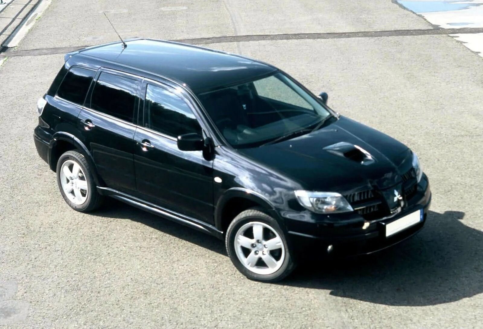 Mitsubishi Outlander 2004. Митсубиси Аутлендер 2003. Mitsubishi Outlander Turbo 2005. Мицубиси Аутлендер 2004 - 2005. Мицубиси аутлендер 2004