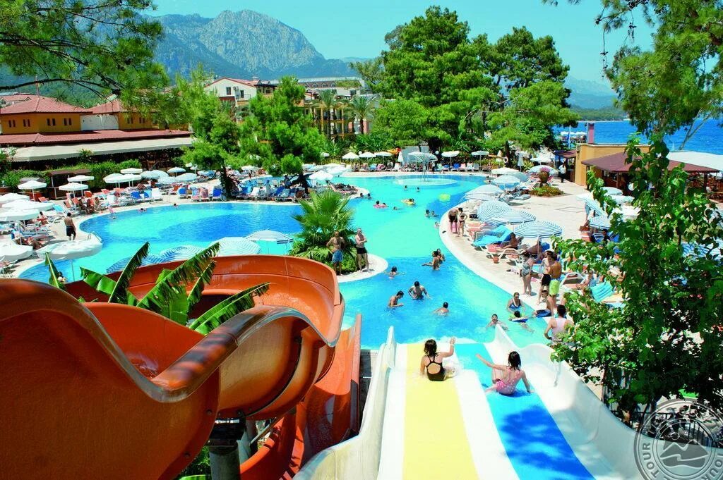 Crystal resort kemer 5. Кристалл Аура Кемер Турция. Crystal Aura Beach Resort 5 Кемер. Crystal Aura Beach Кемер. Алатимия Виладж Кемер.