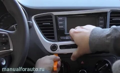 Как снять магнитолу солярис