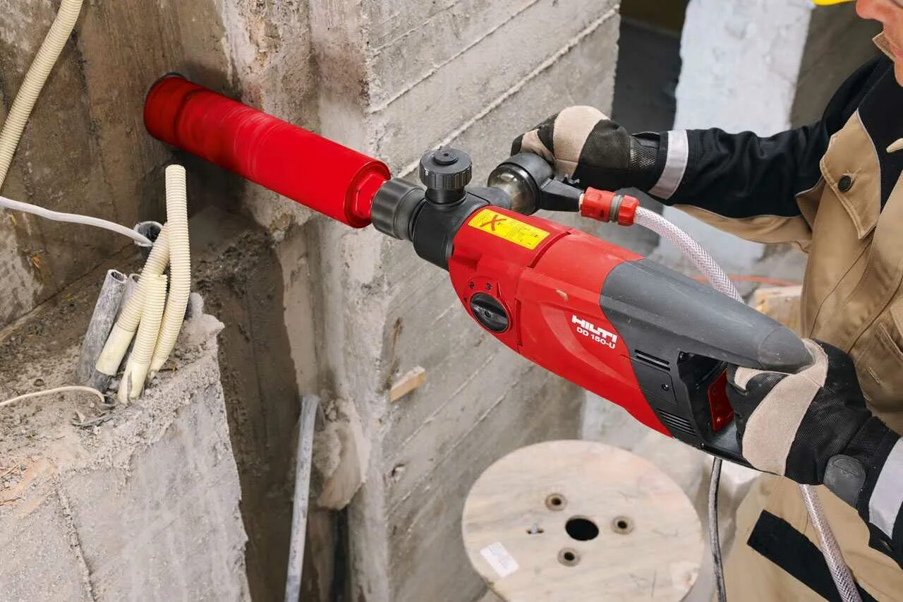 Пробурить отверстие в стене. Алмазное бурение хилти. Hilti DD 150. Алмазное сверление Hilti. Hilti бурение бетона.