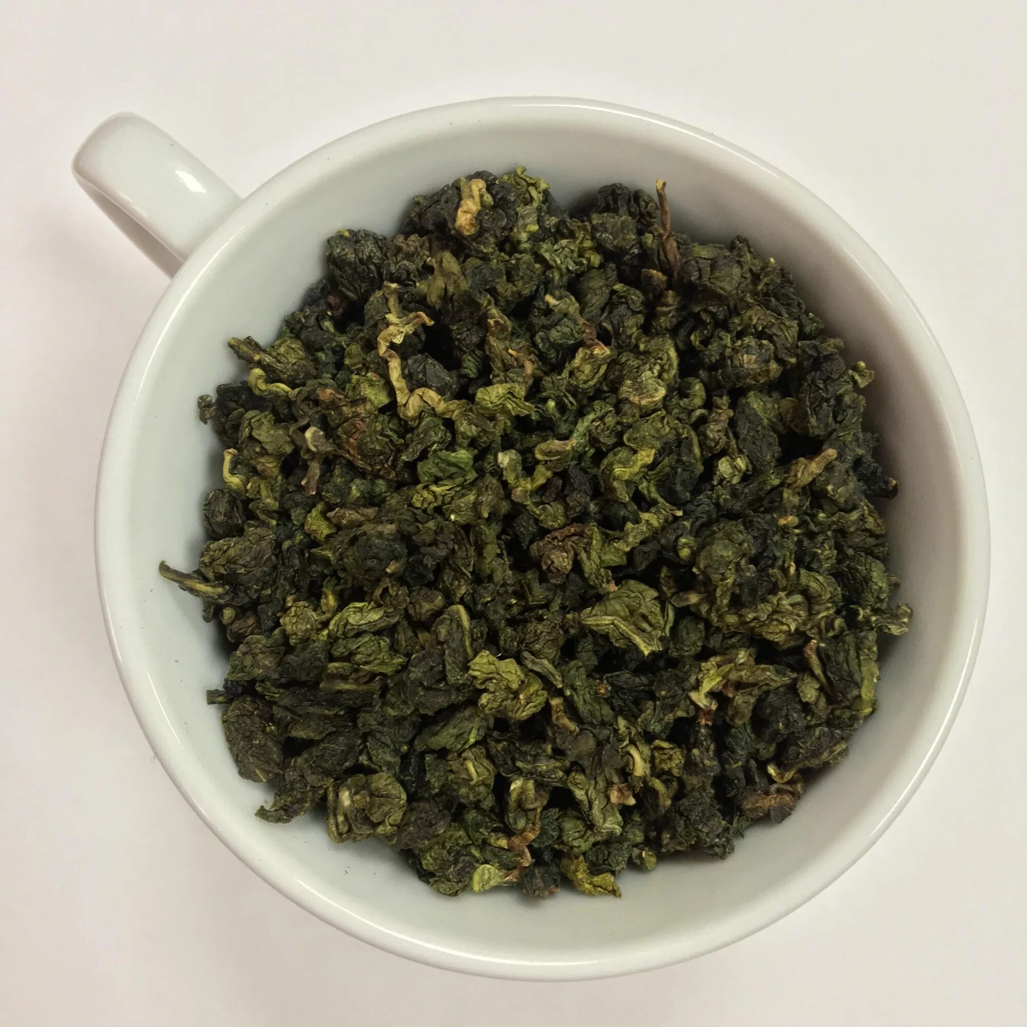 Улун те Гуань Инь. Зелёный чай молочный улун. Улун те Гуань Инь чай. Чай молочный оолонг зеленый.
