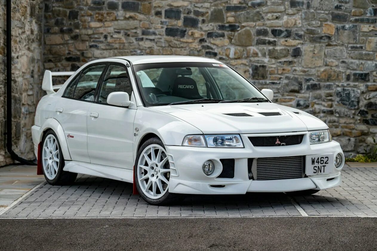 Evo tl. Мицубиси Эволюшн 6. Мицубиси Лансер Эволюшн 6. Mitsubishi Lancer Evolution 1999. Mitsubishi Lancer EVO 6.5.