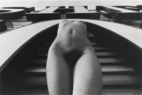 Female nude against facade by Lucien Clergue (1975) 