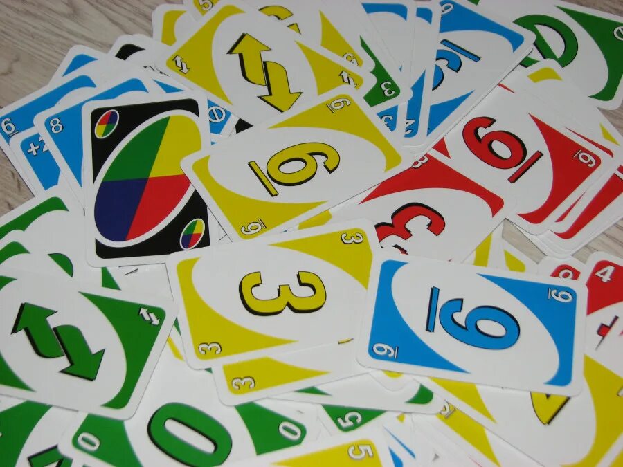 уно игра. популярные настольные игры уно. уно играть. игра в уно люди. Uno версии игры.