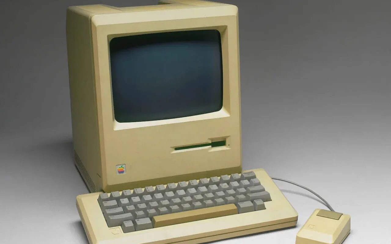 Что делал первый компьютер. Компьютер Apple Macintosh (1984). Компьютер макинтош 1984. Apple Macintosh 1. Самый первый компьютер Эппл 1976.