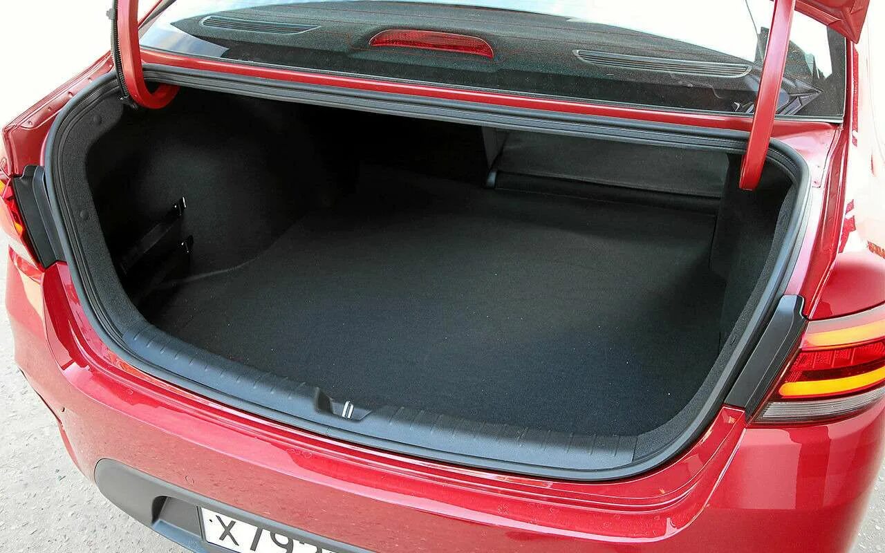 Коврик в багажник киа рио 3. Багажник рио 3 седан. Багажник киа церато 3. Багажник рио 3 седан. Регулировка крышки багажника kia cerato 2.