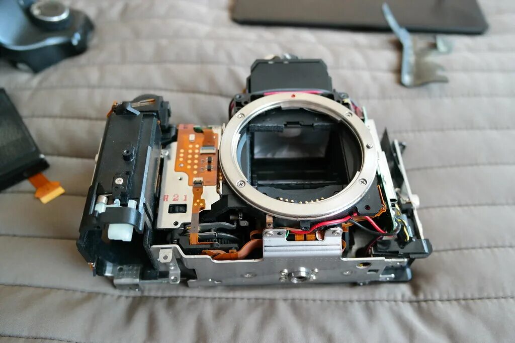 разбор объектива canon 15-85. резиновые кольцо canon 24-105 объектив. детали объективы разбор. разбор объектива canon 15-85. Disassembled canon.