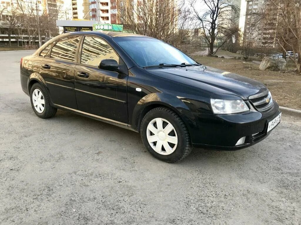 Купить лачетти 2012. Chevrolet Lacetti 2004-2012. Chevrolet Lacetti 2012 Black. Шевроле Лачетти черный седан 2012. Chevrolet Lacetti 2012 седан.