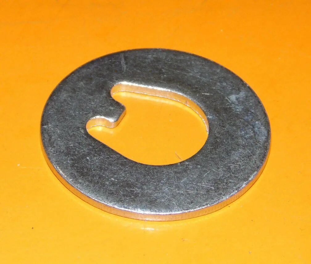 Шайба ступицы камаз 5320. Шайба стопорная задней ступицы фольксваген гольф 3. Шайба задней ступицы. Шайба задней ступицы. 94525238 шайба ступицы.