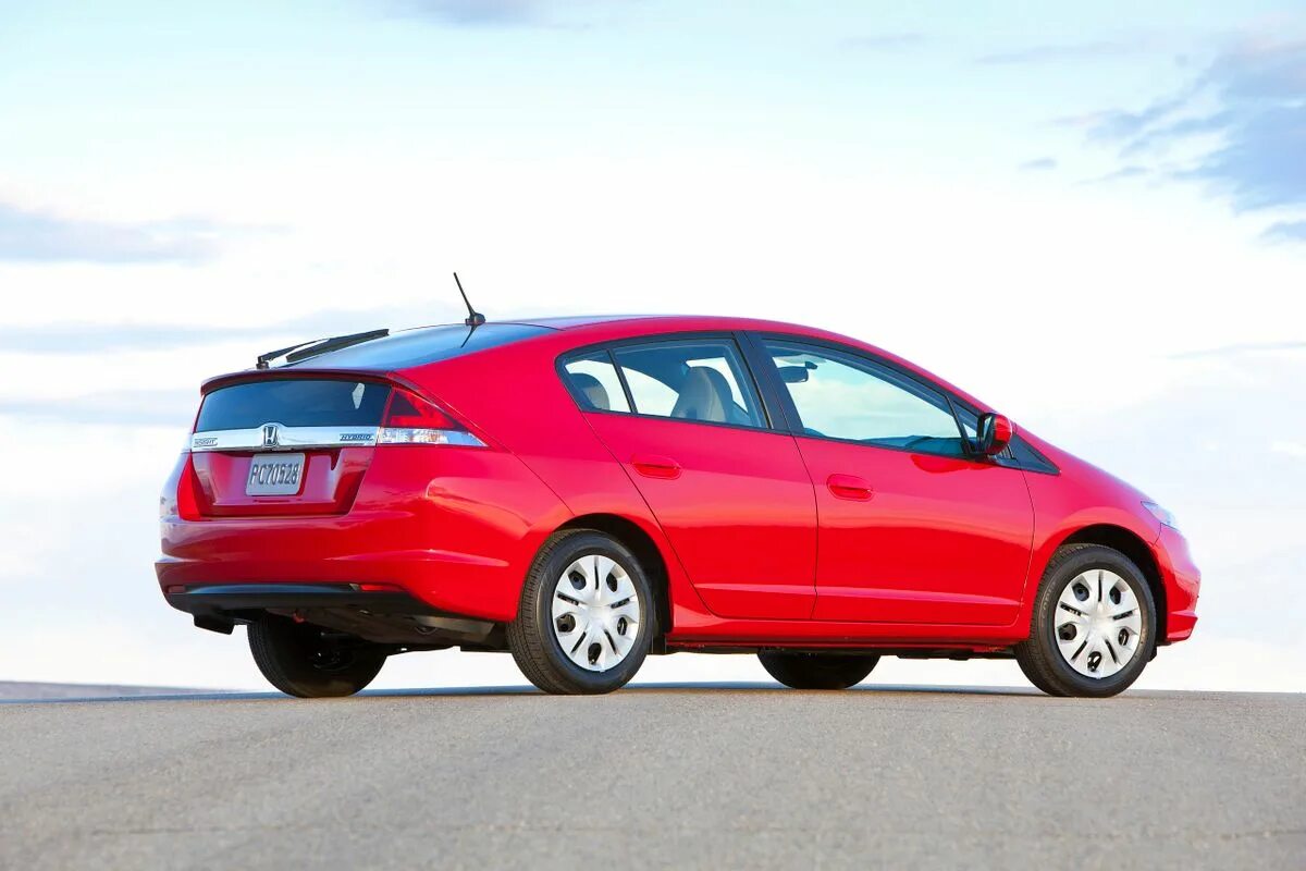 Инсайт купить. Honda Insight Hybrid 2012. Honda Insight 2011. Honda Insight 2014. Honda Insight 2009.