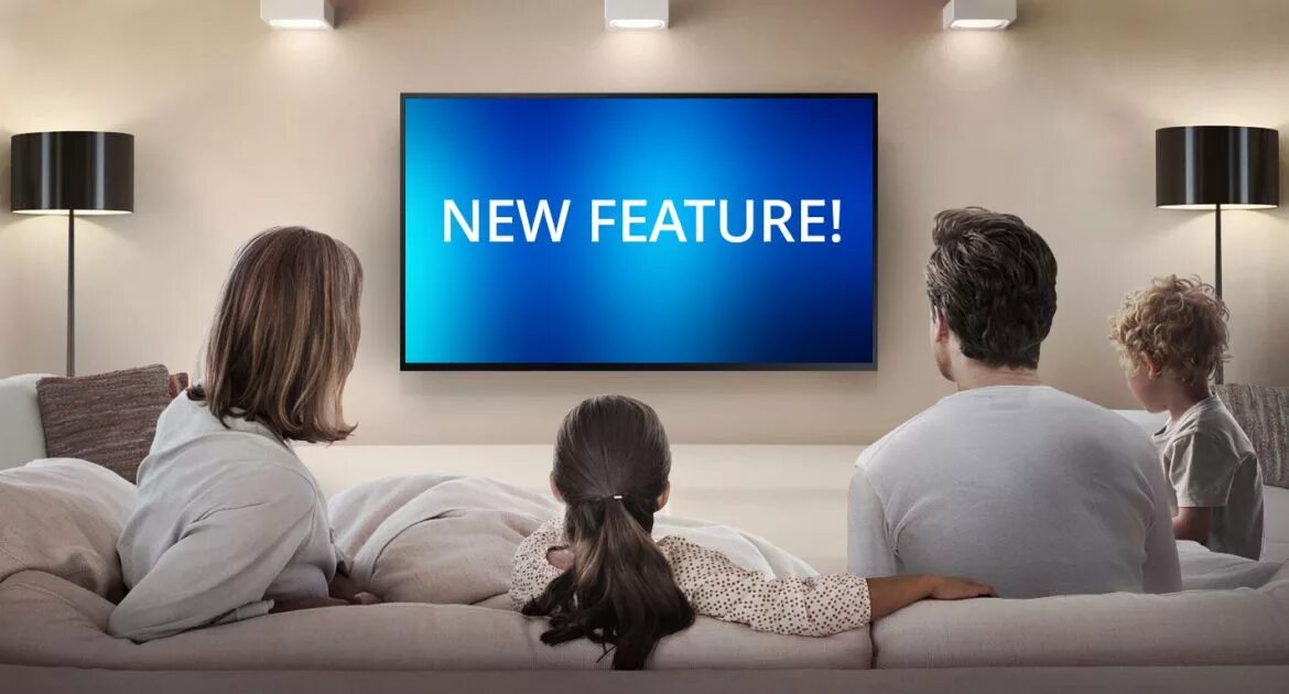 He is watching tv at the moment. Телевизор. Человек телевизор. Семья у телевизора. Семья у телевизора спиной.