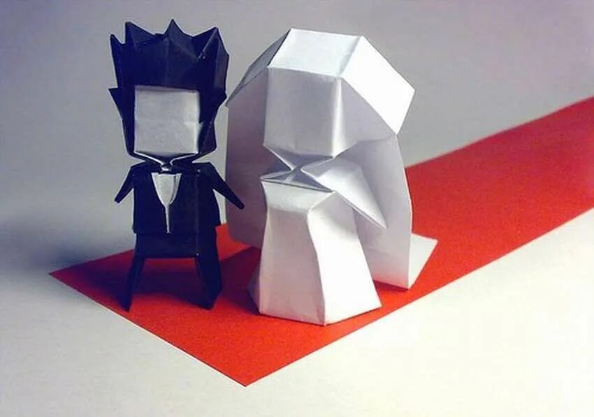 Оригами семей. Оригами человек. Объемный человек из бумаги. Человечки из бумаги. Поделка человек из бумаги.