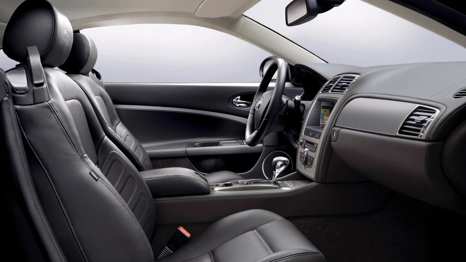 Jaguar XK Coupe 2006 салон. Inside машина. Ягуар XKR салон. Ягуар XKR интерьер.