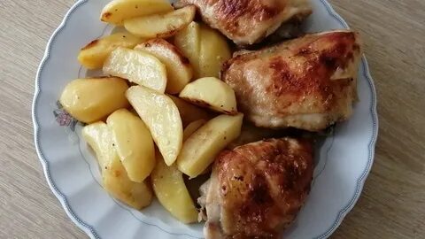 Картошка с окорочками в духовке фото