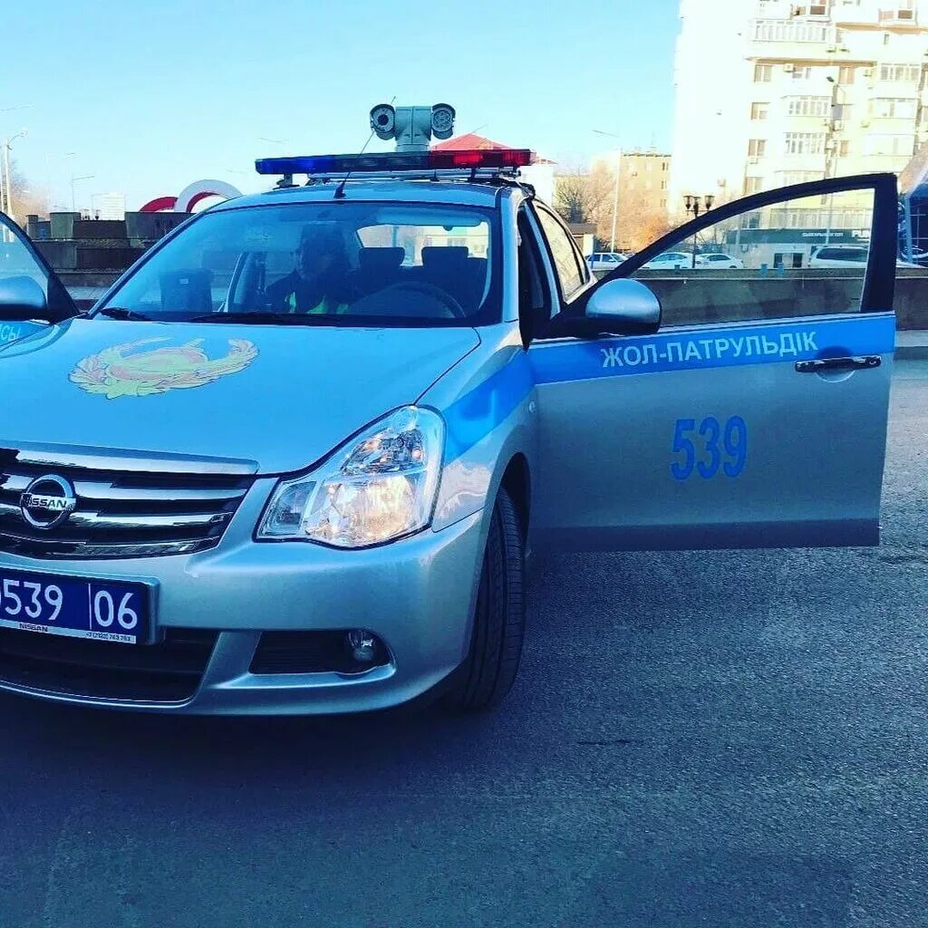 15 полицейская машина. Ниссан Альмера g15 с мигалками. Nissan Almera полиция. Ниссан Альмера g15 полиция. Казахстанские полицейские машины.