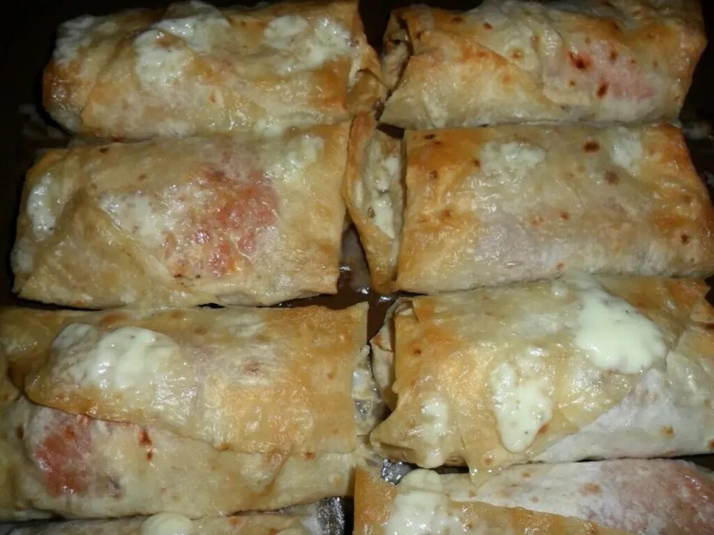 конвертики из лаваша с рыбой в духовке. минтай, запеченыйв лаваше. рулет из лаваша запеченный в духовке.