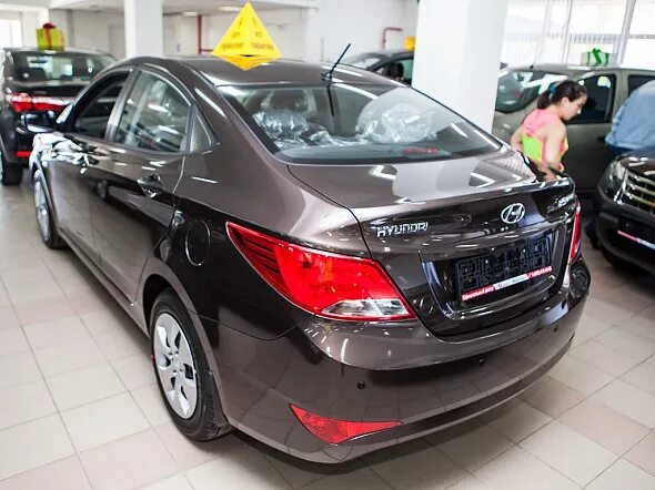 Хендай солярис 2015 1.6. Hyundai Solaris 1.6 2015. Hyundai Solaris 2015 коричневый. Hyundai Solaris 2015 автомат. Хендай Солярис 2015г.