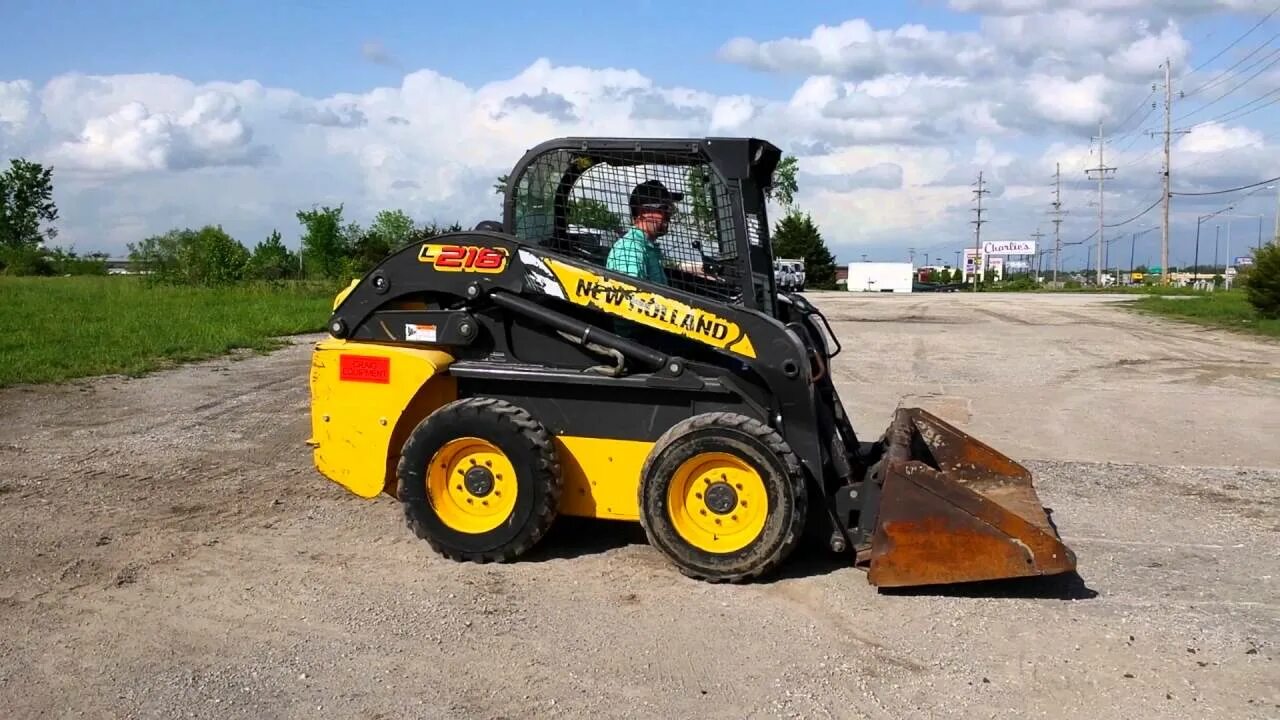 Holland l218. New holland l218 погрузчик. минипогрузчик new holland l218. нью холланд л 218. new holland мини погрузчик.
