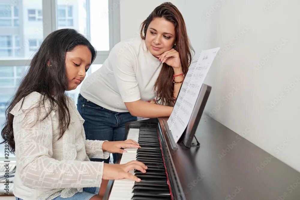 Look she playing the piano