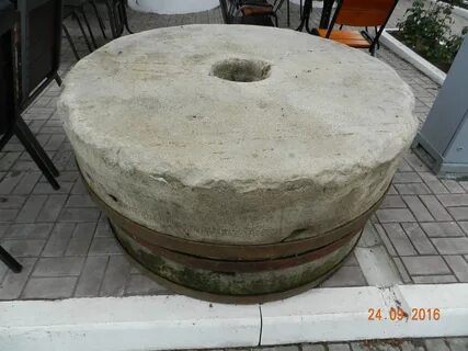 Мельничный жернов как пишется
