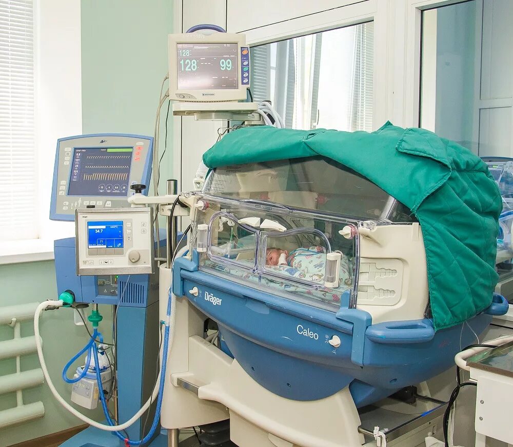 Неотерм -реанимационный стол для интенсивной терапии новорожденных. Перинатальный центр реанимация новорожденных. Отделение реанимации и интенсивной терапии новорожденных. Реанимация новорожденых.