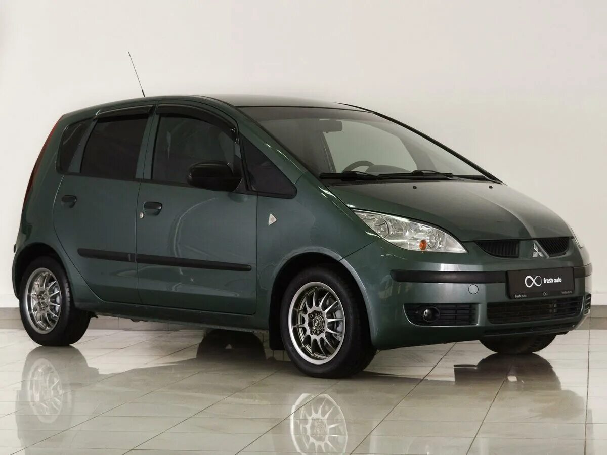 Mitsubishi colt 6. Митсубиси Кольт 1.3 2004. Мицубиси Кольт 6 поколения. Colt 2007 1.3 z30. Кольт Митсубиши зеленая.