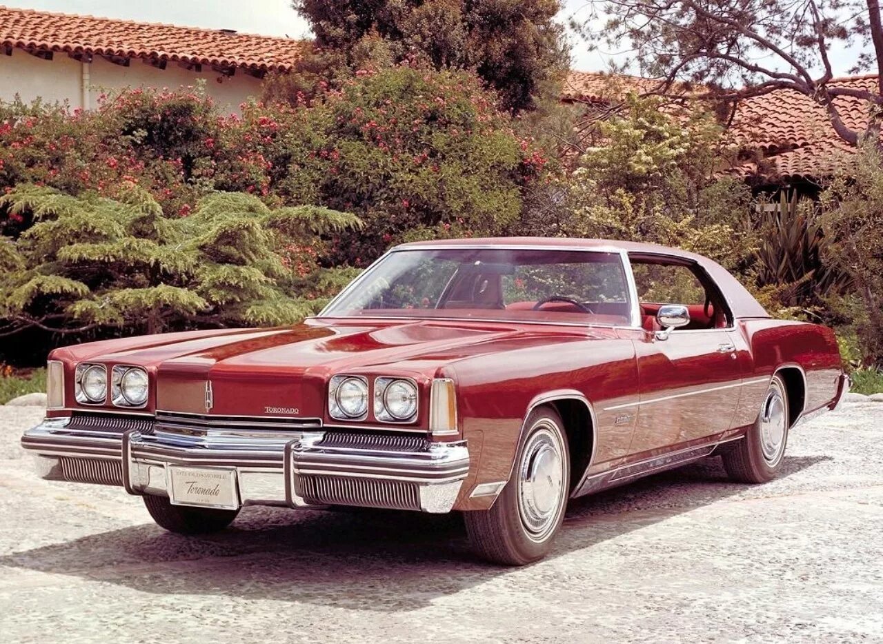 Купить американскую машину. Oldsmobile Toronado 1972. Олдсмобиль Торнадо 1973. Олдсмобиль Торнадо 1972. Oldsmobile Toronado 1973.