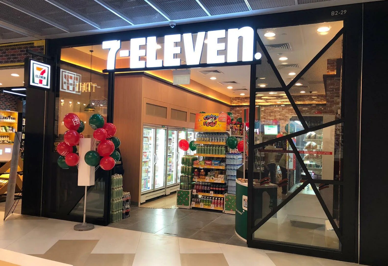 7 11 shop. 7 Элевен магазин. 7eleven Москва. Магазин 7 Eleven в Москве. Магазин Севен Элевен в Москве.