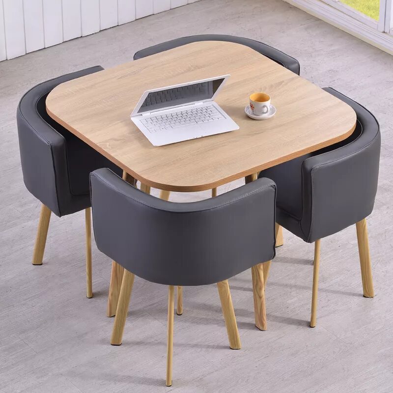 Компактный круглый стол. Деревянный стол на кухню. Стулья под столом. Обеденные столы 2022 тренды. Стул eames сканди грин.