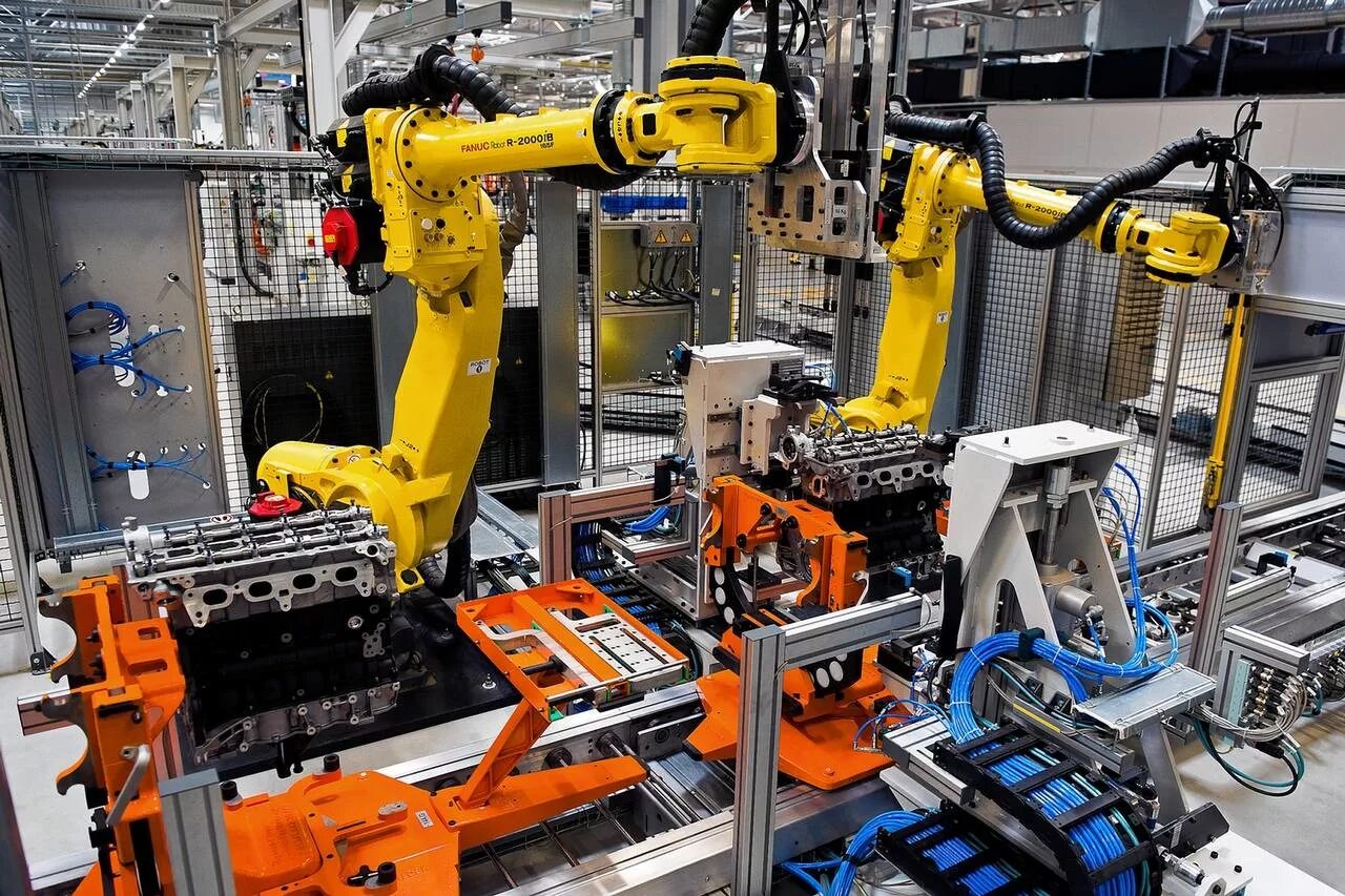 Robot factory. Роботы фирмы Fanuc. Роботизированный Технологический комплекс РТК. Fanuc производители роботов. Автоматизация производства.