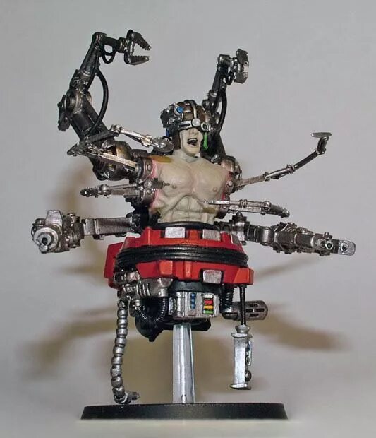 Сервитор это. Сервиторы вархаммер 40000. warhammer 40k сервиторы. сервитор warhammer. боевой сервитор warhammer 40000.