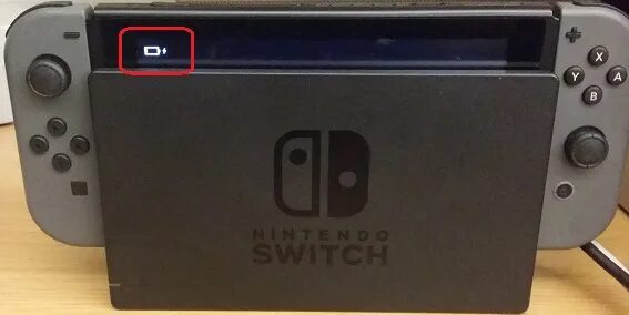 Nintendo switch не включается. Nintendo Switch не заряжается. Индикатор зарядки Нинтендо свитч. Нинтендо свитч в док станции сбоку. Зарядка и док станция свитч Нинтендо.