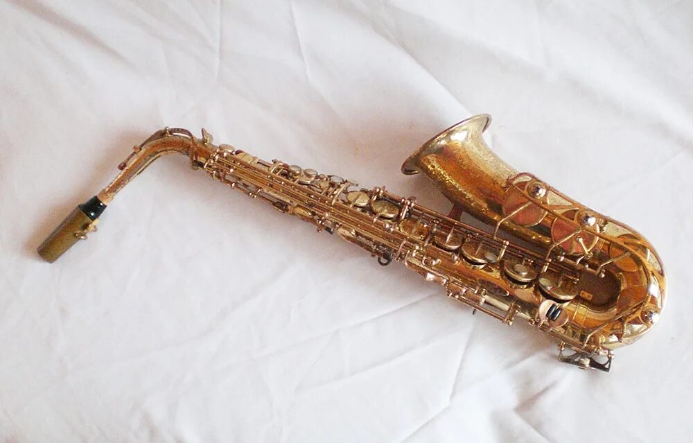 мастер духовых инструментов. медные духовые музыкальные инструменты. георгий сибилев брасс-квинтет. саксофон. мастер духовых инструментов.