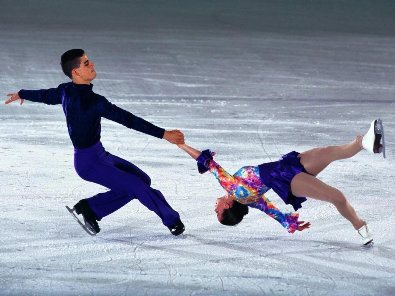 He is skating. Зимние виды спорта. Зимние виды спорта коньки. Фигурное катание на коньках.