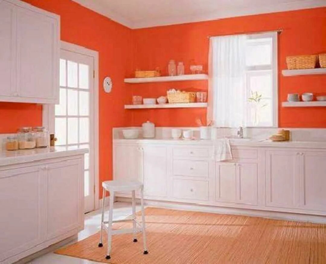 Чем можно покрасить кухню. Оранжевая стена. Крашенные стены на кухне. Кухня в персиковых тонах. Кухня с коралловыми стенами.