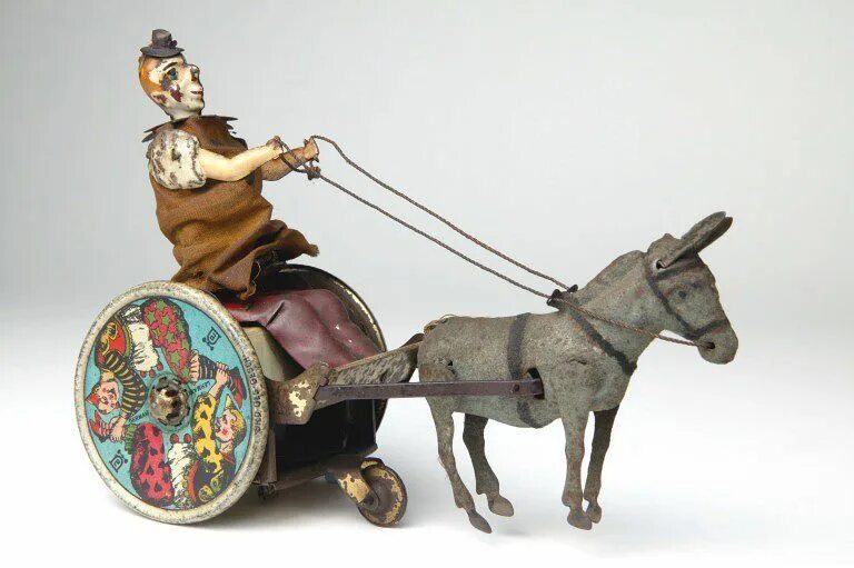 В каком веке были игрушки. Старинные игрушки. Игрушки средневековья. Игрушки 19-20 века. Заводные игрушки 19 века.