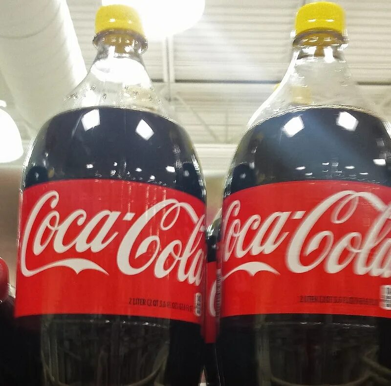 Перевод слова колы. Coca Cola кошерная. Coca Cola желтая. Кока кола с желтой крышкой. Кока кола крышка.