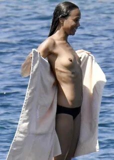 Zoe saldana caught topless.