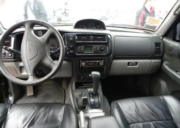 Pajero sport 2006. Митсубиси Монтеро спорт 2006. Митсубиси Паджеро спорт 2000. Mitsubishi Pajero Sport 2006 салон. Паджеро спорт 1 салон.